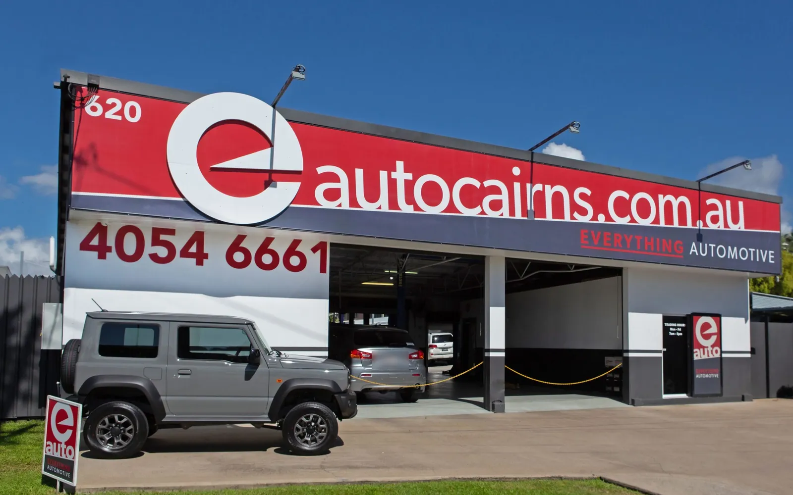 The Everything Automotive workshop at 620 Bruce Highway, Woree, with its roller doors open
